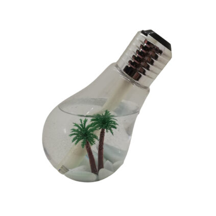 Humidificateur en forme d'ampoule avec des galets et deux palmiers à l'intérieur