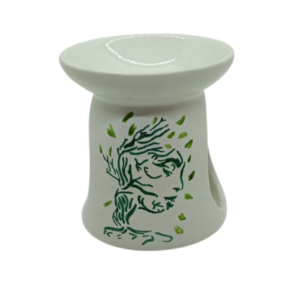 Brûle-parfum blanc avec peinture représentant un arbre de vie vert où l'on distingue le visage d'une femme